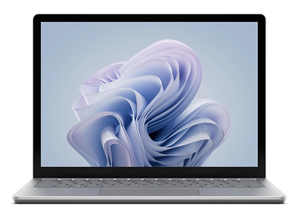 Front view of a modern laptop displaying a stylized abstract wallpaper on the screen.
